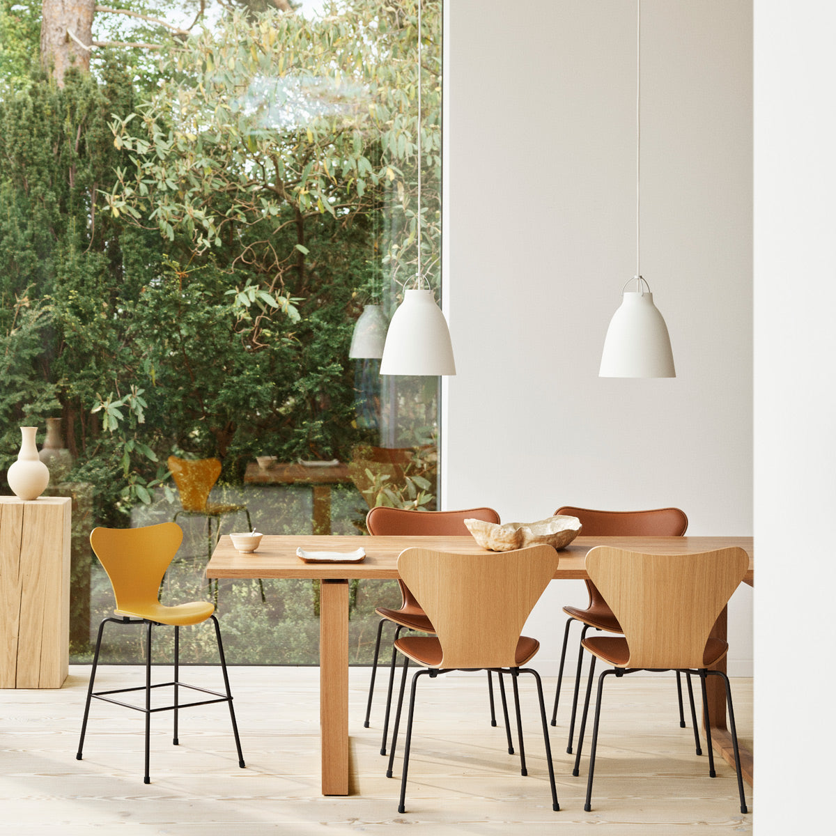 Caravaggio Pendant by Fritz Hansen, showing caravaggio pendants in live shot.
