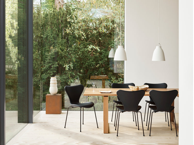 Caravaggio Pendant by Fritz Hansen, showing caravaggio pendants in live shot.