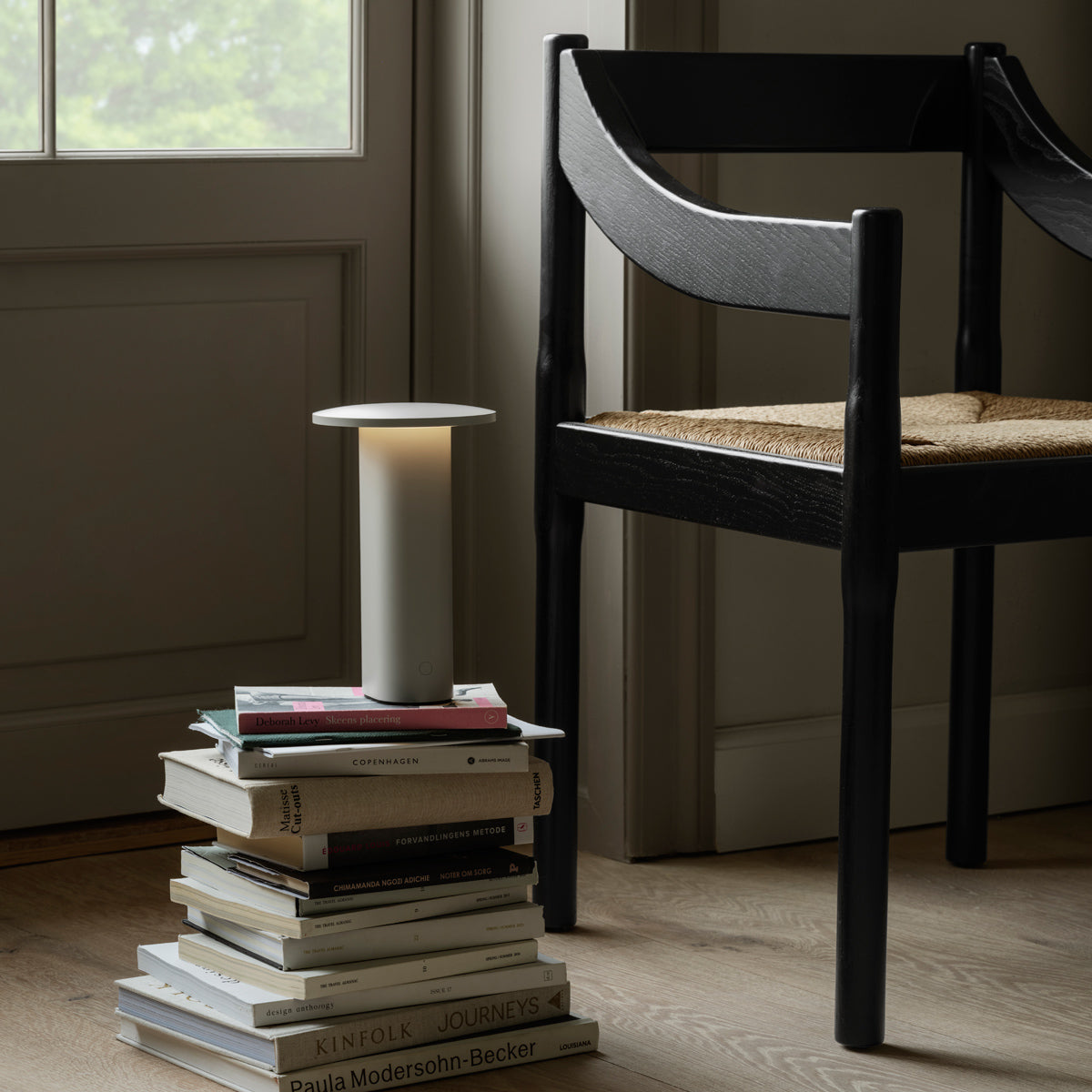 Carimate Chair by Fritz Hansen, showing closeup view of carimate chair in live shot.
