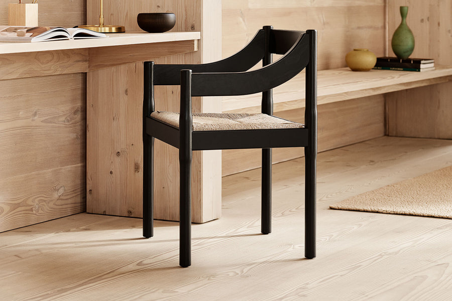 Carimate Chair by Fritz Hansen, showing carimate chair in live shot.