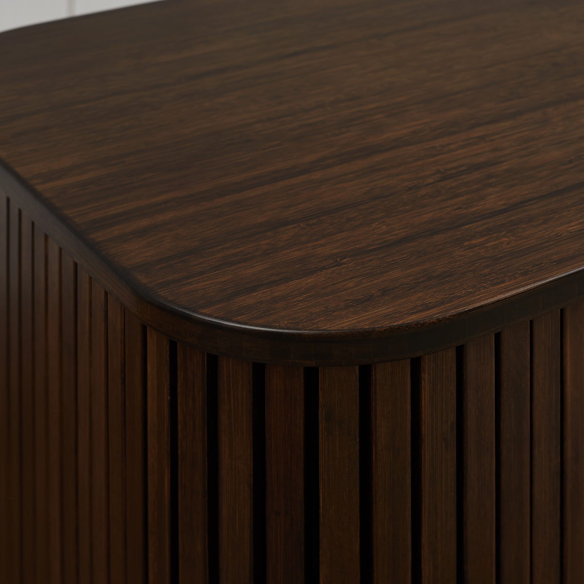 Carmel Console Table by Greenington, showing closeup view of carmel console table in live shot.