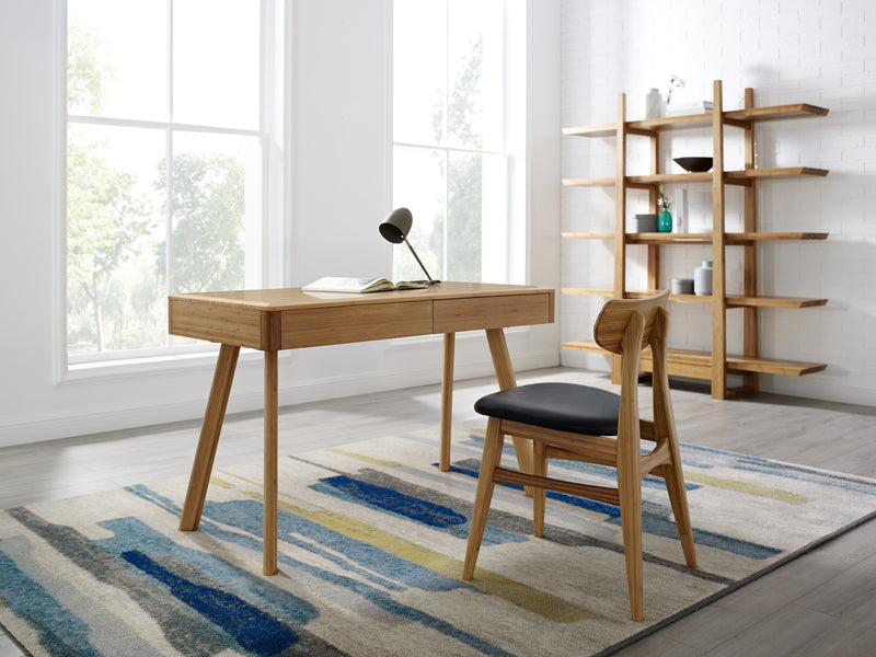 Cassia Dining Chair by Greenington, showing cassia dining chair with table in live shot.