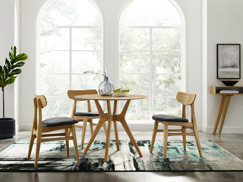 Cassia Dining Chair by Greenington, showing cassia dining chairs with table in live shot.