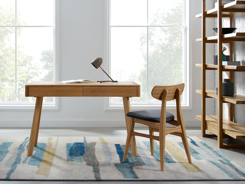 Cassia Dining Chair by Greenington, showing cassia dining chair with table in live shot.