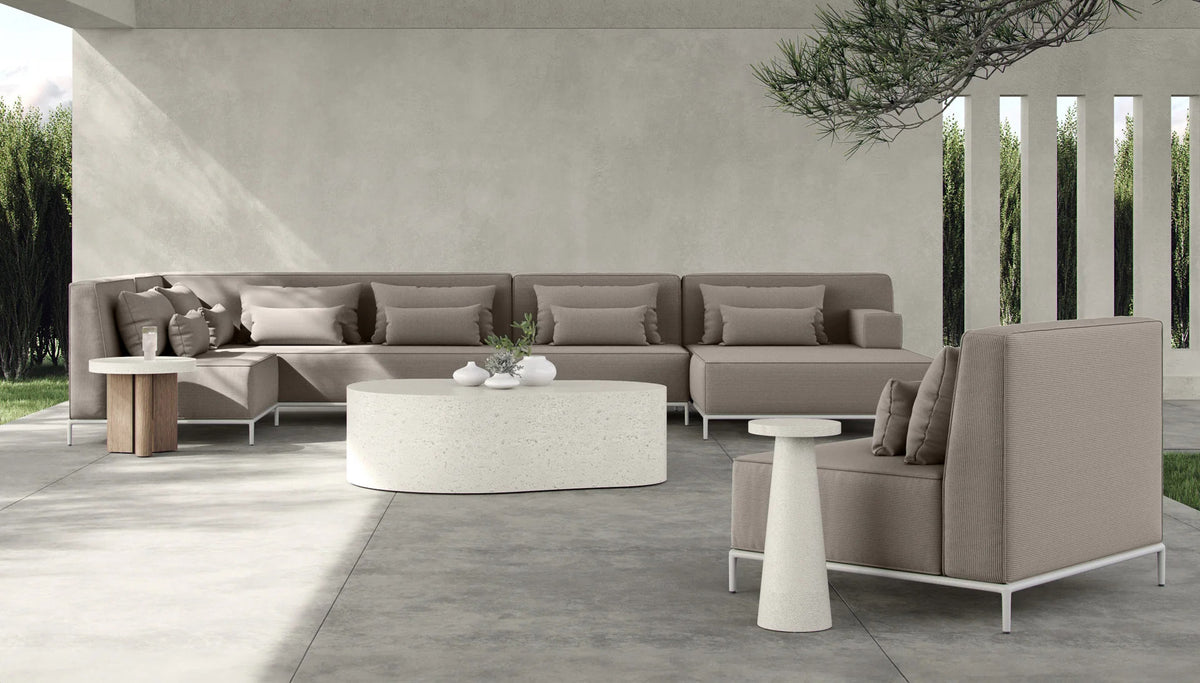 Cavora Outdoor Coffee Table by Viesso, showing cavora outdoor coffee table in live shot.