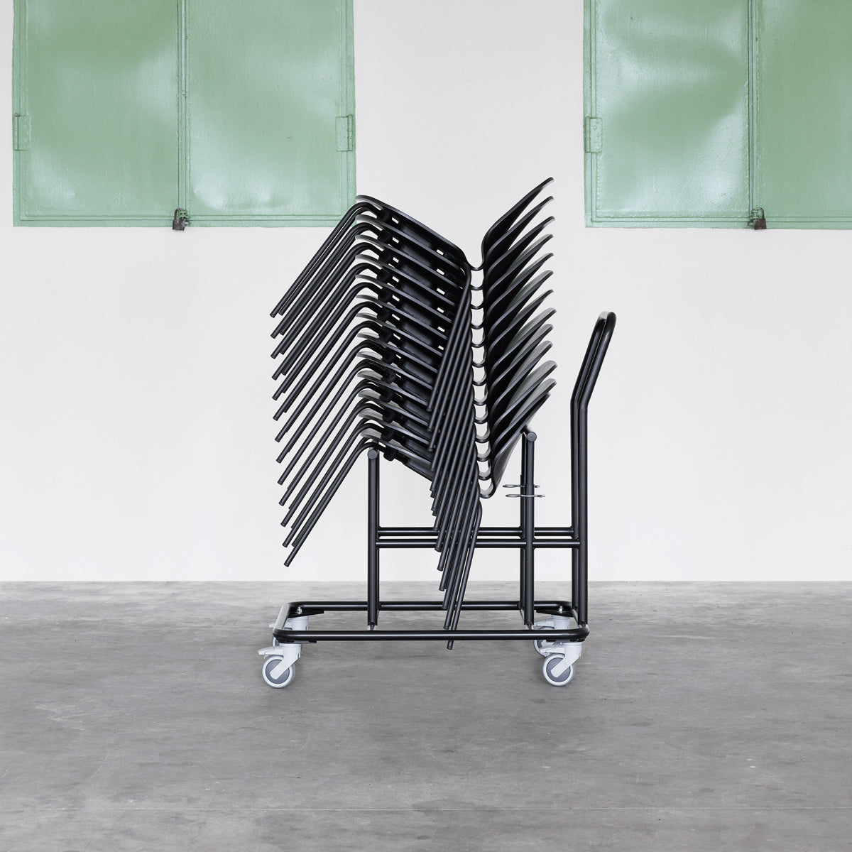 Chair Rack by Normann Copenhagen, showing chair rack with chairs in live shot.