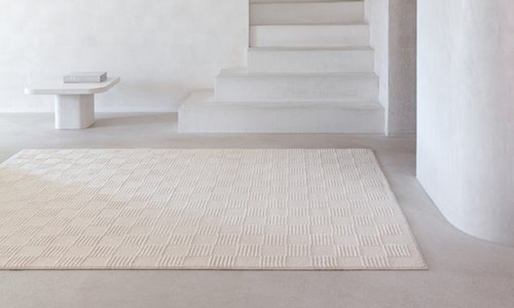 Check Woven Rug by Ligne Pure, showing check woven rug in live shot.