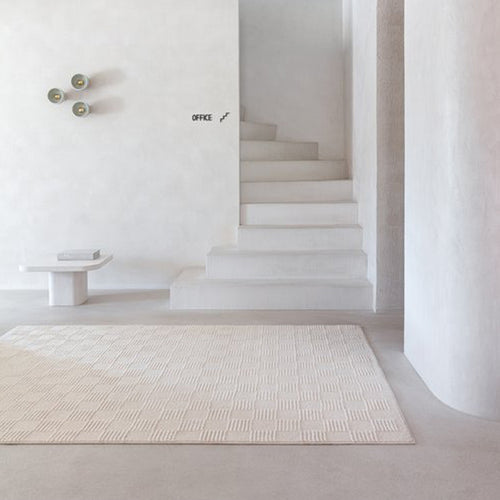 Check Woven Rug by Ligne Pure, showing check woven rug in live shot.