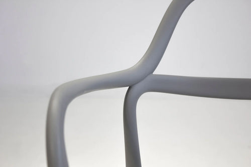 Chewie Stackable Armchair by Mobital, showing closeup view of chewie stackable armchair in live shot.