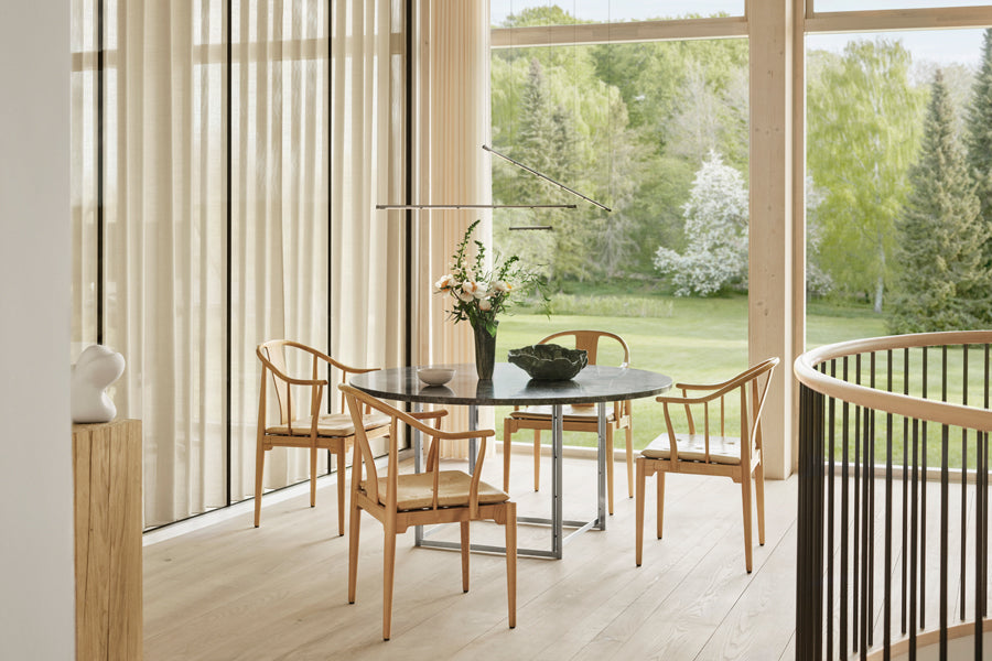 China Chair by Fritz Hansen, showing china chairs in live shot.