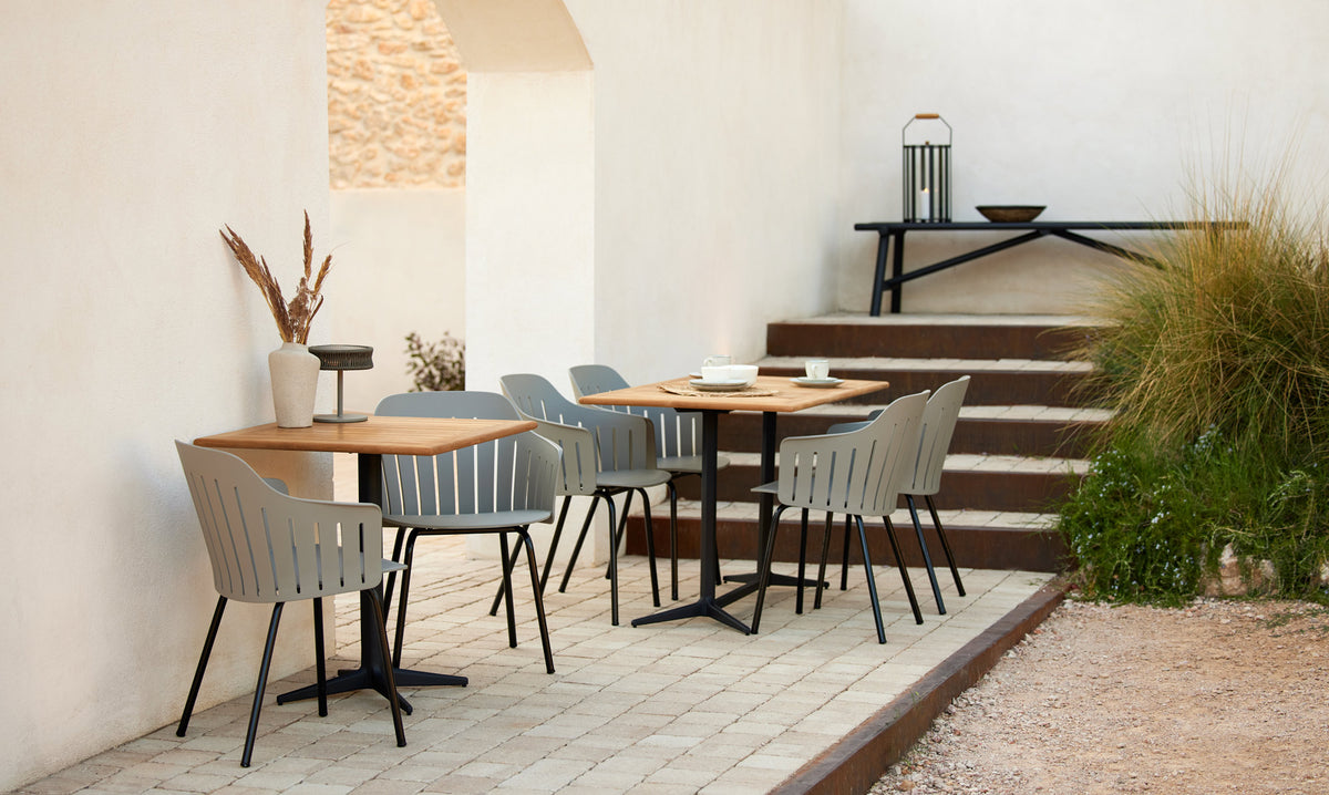 Choice 4 Legs Outdoor Chair by Cane-Line, showing choice 4 legs outdoor chairs in live shot.