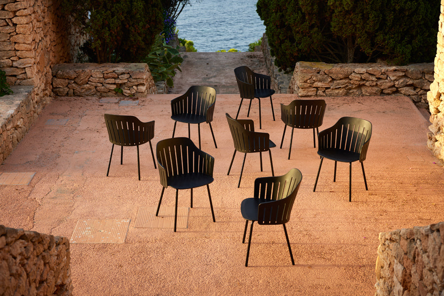 Choice 4 Legs Outdoor Chair by Cane-Line, showing choice 4 legs outdoor chairs in live shot.