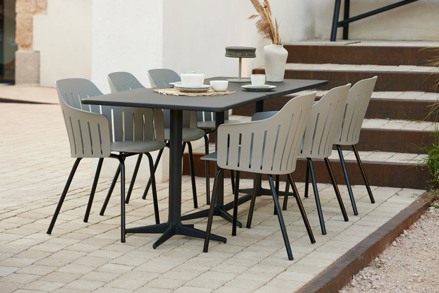 Choice 4 Legs Outdoor Chair by Cane-Line, showing choice 4 legs outdoor chairs in live shot.