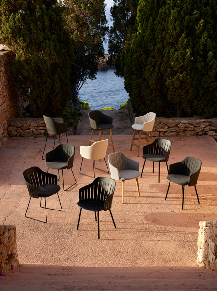 Choice 4 Legs Outdoor Chair by Cane-Line, showing choice 4 legs outdoor chairs in live shot.