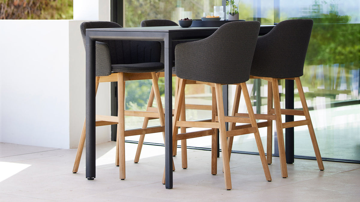 Choice Outdoor Wood Chair by Cane-Line, showing choice outdoor wood chairs in live shot.