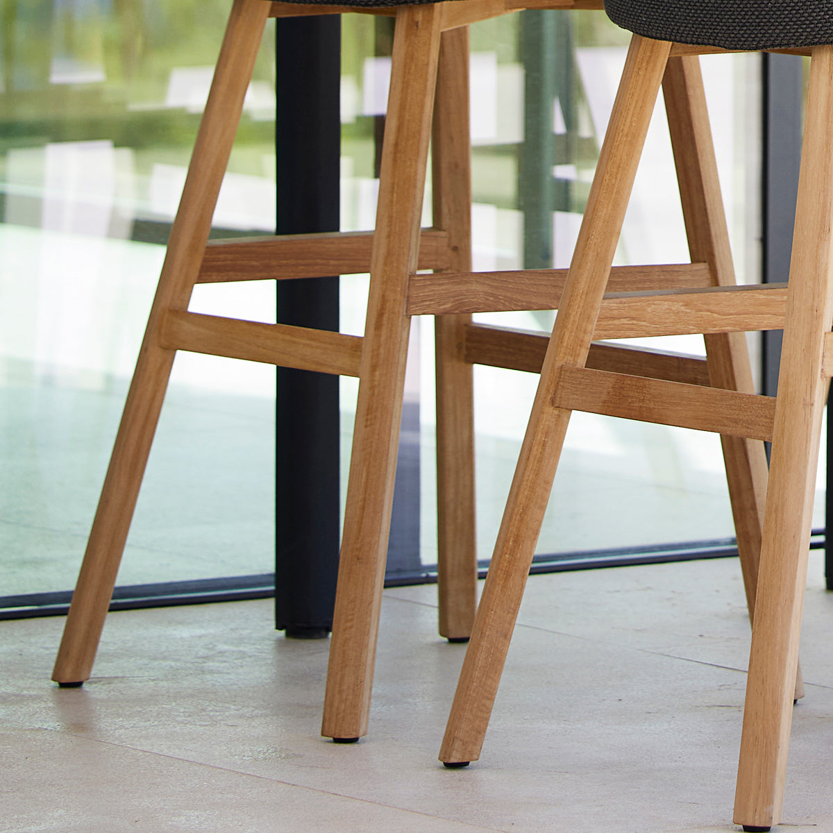 Choice Outdoor Wood Chair by Cane-Line, showing closeup view of choice outdoor wood chairs in live shot.