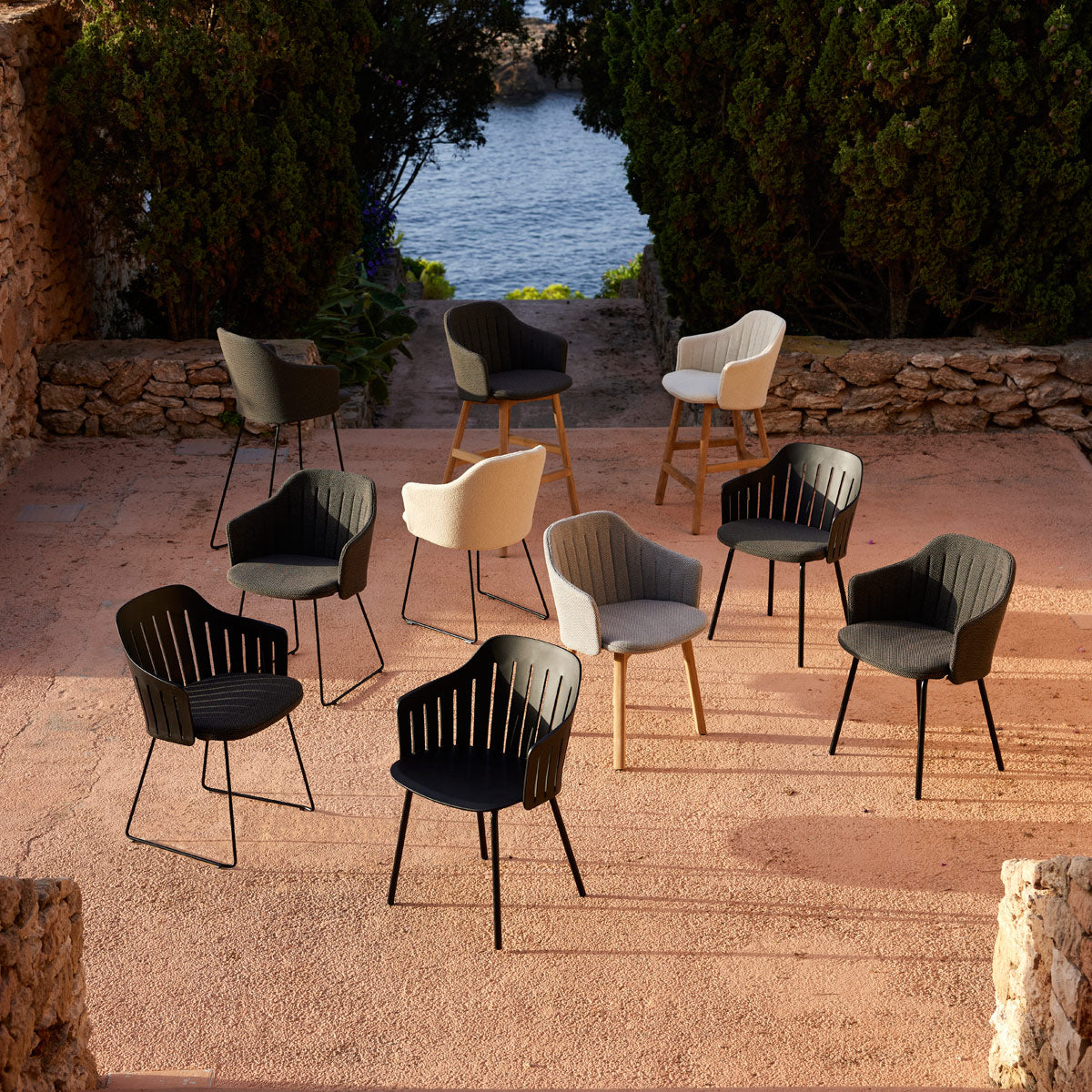 Choice Sled Outdoor Chair by Cane-Line, showing choice sled outdoor chairs in live shot.