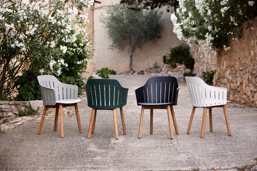 Choice Wood Chair by Cane-Line, showing choice wood chairs in live shot.