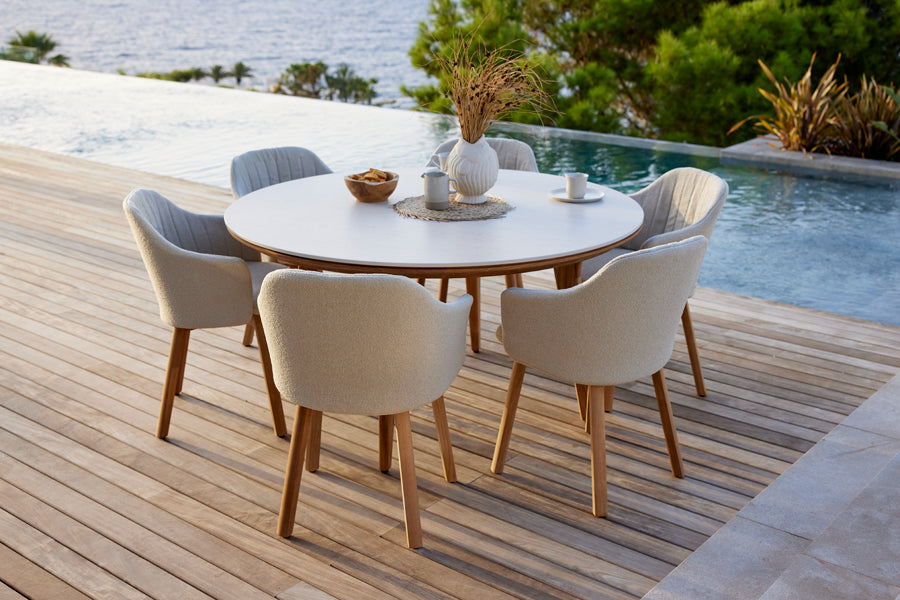 Choice Wood Chair by Cane-Line, showing choice wood chairs in live shot.