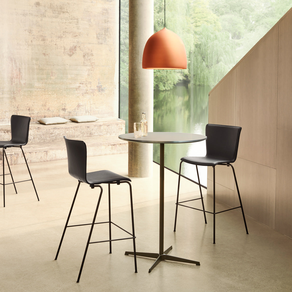 Circular Bar Table by Fritz Hansen, showing circular bar table in live shot.