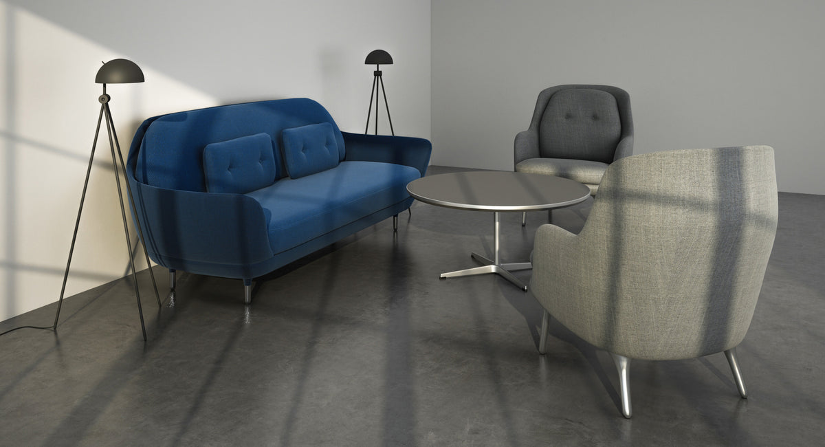 Circular Coffee Table by Fritz Hansen, showing circular coffee table in live shot.