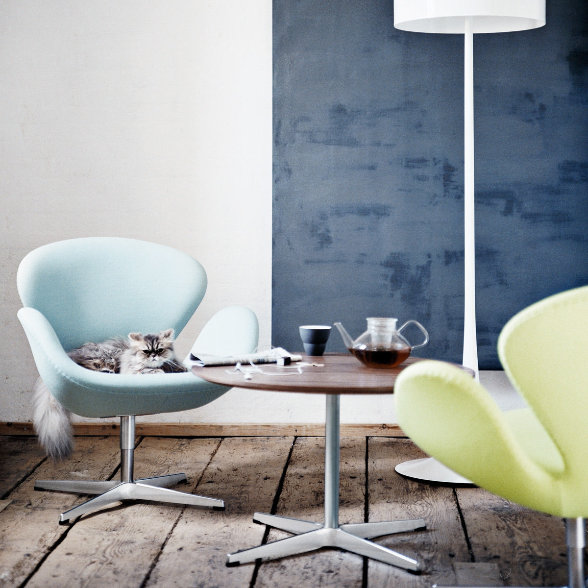 Circular Coffee Table by Fritz Hansen, showing circular coffee table in live shot.