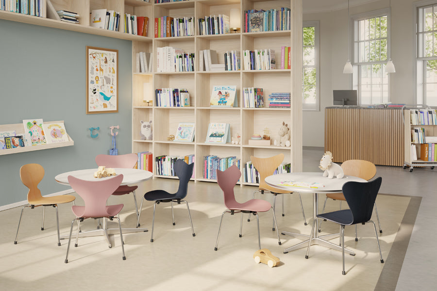 Circular Coffee Table by Fritz Hansen, showing circular coffee tables in live shot.