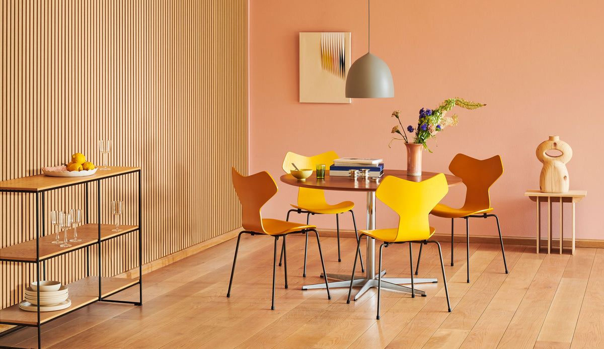Circular Table by Fritz Hansen, showing circular table in live shot.