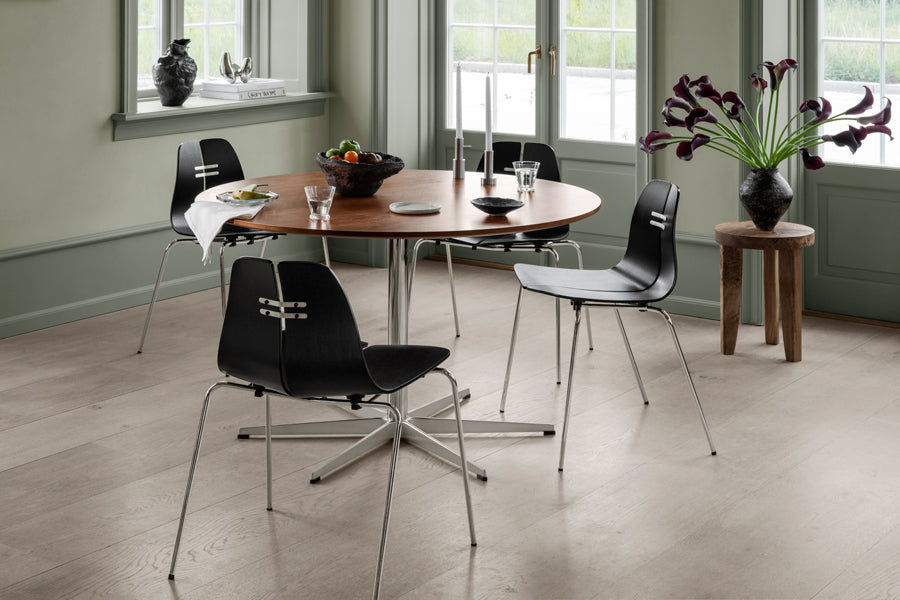 Circular Table by Fritz Hansen, showing circular table in live shot.