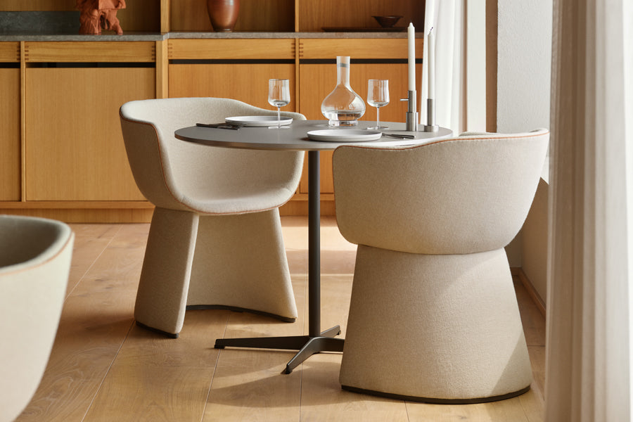 Circular Table by Fritz Hansen, showing circular table in live shot.