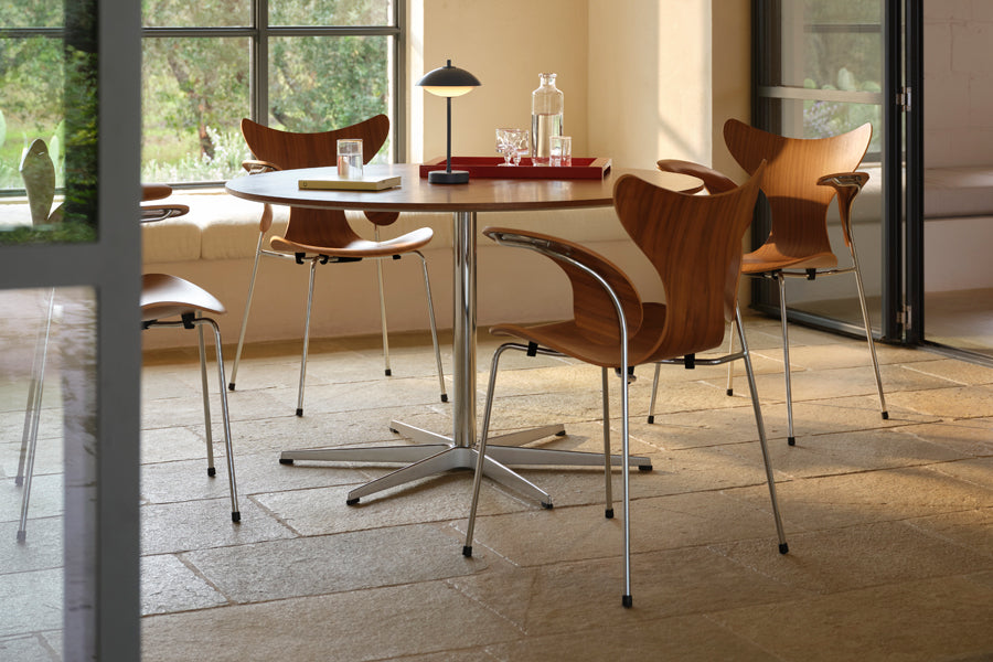 Circular Table by Fritz Hansen, showing circular table in live shot.
