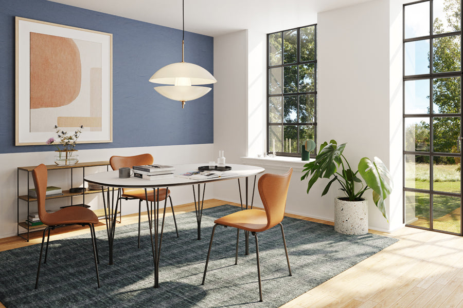 Clam Pendant by Fritz Hansen, showing clam pendant in live shot.