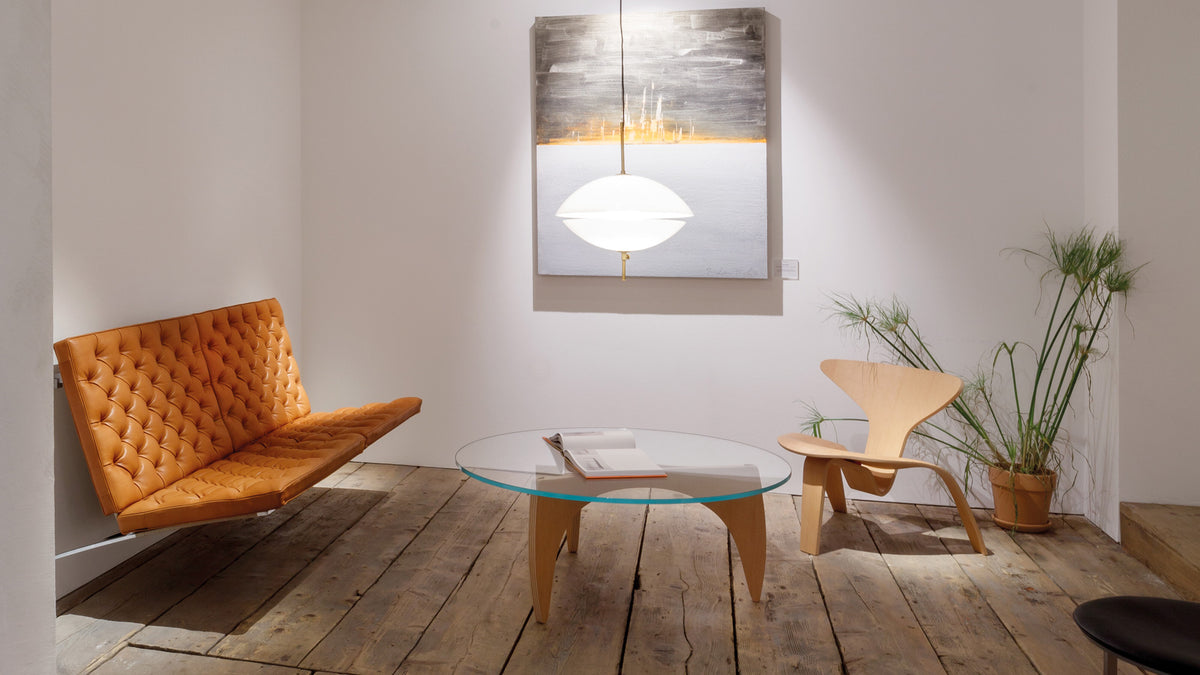 Clam Pendant by Fritz Hansen, showing clam pendant in live shot.