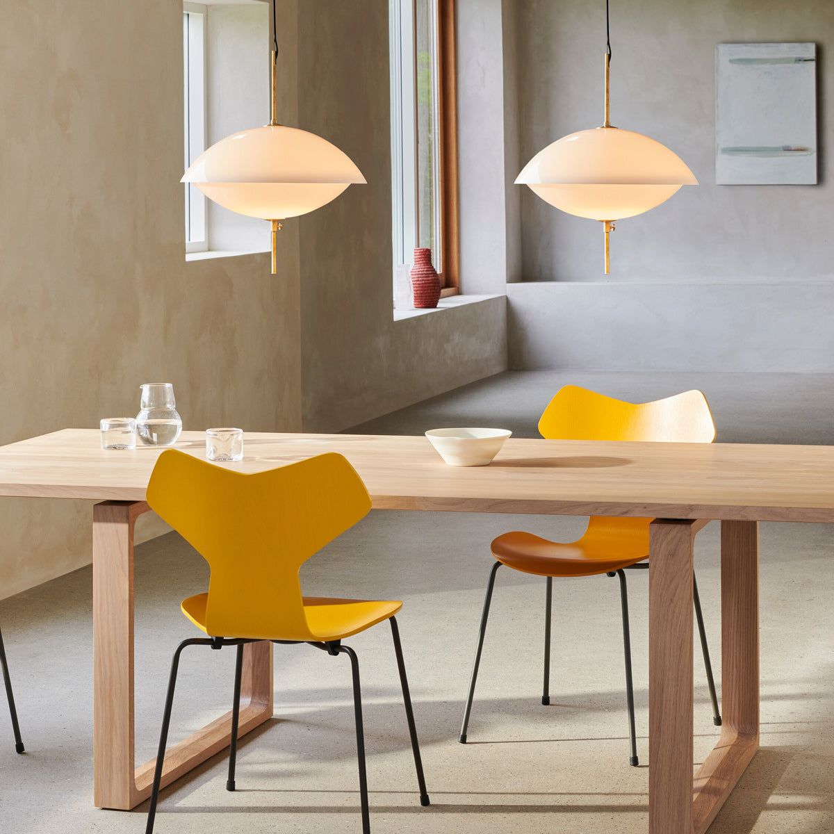 Clam Pendant by Fritz Hansen, showing clam pendants in live shot.
