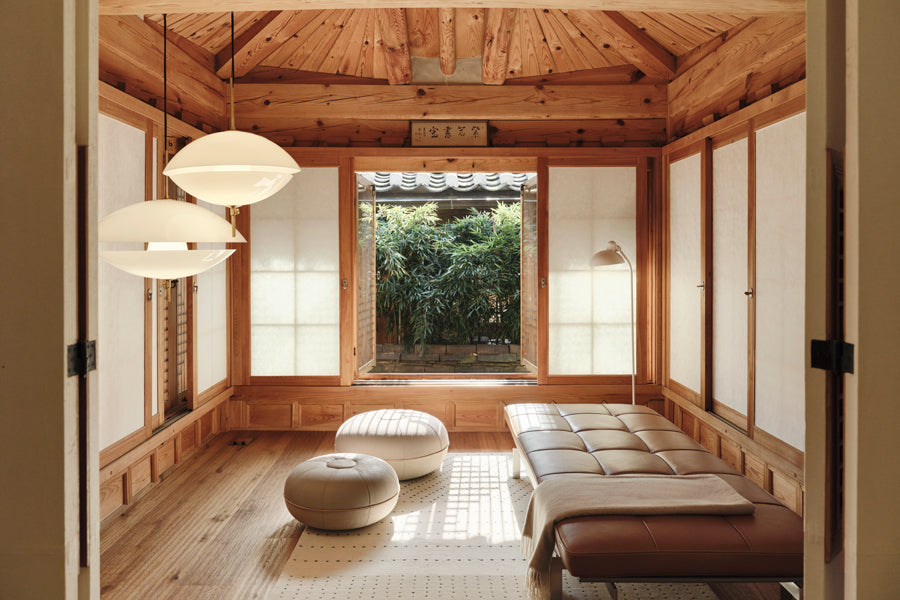 Clam Pendant by Fritz Hansen, showing clam pendants in live shot.