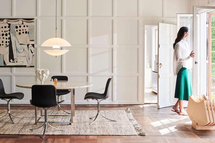 Clam Pendant by Fritz Hansen, showing clam pendant in live shot.