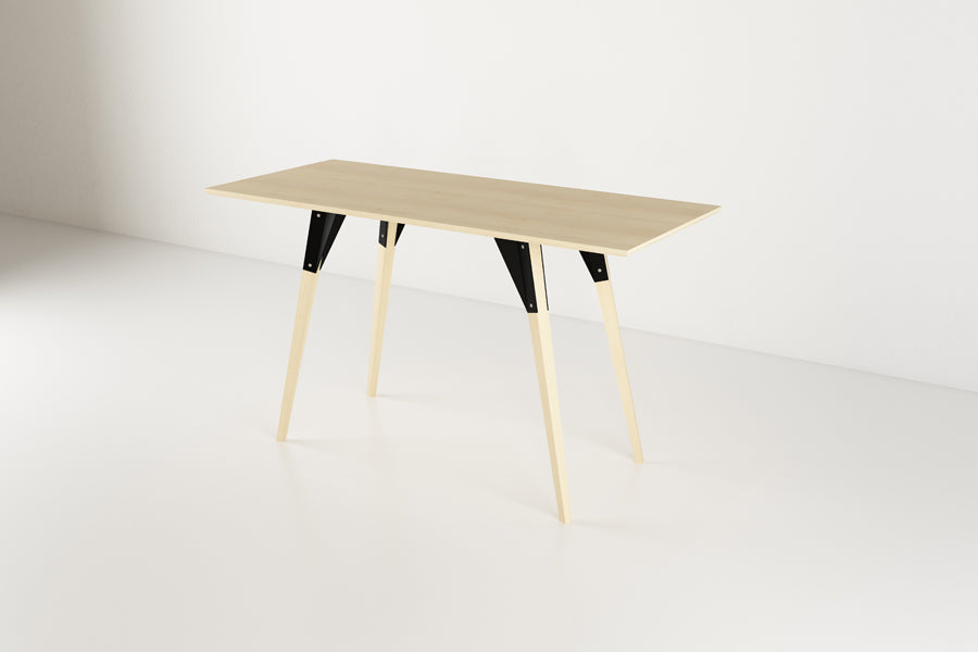 Clarke Desk by Tronk Design, showing angle view of clarke desk in live shot.