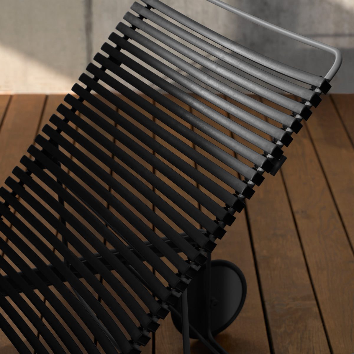 Click Adjustable Chaise Sunlounger by Houe, showing closeup view of click adjustable chaise sunlounger in live shot.