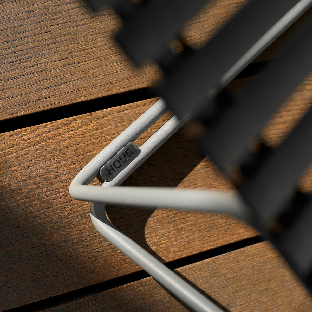 Click Adjustable Chaise Sunlounger by Houe, showing closeup view of click adjustable chaise sunlounger in live shot.