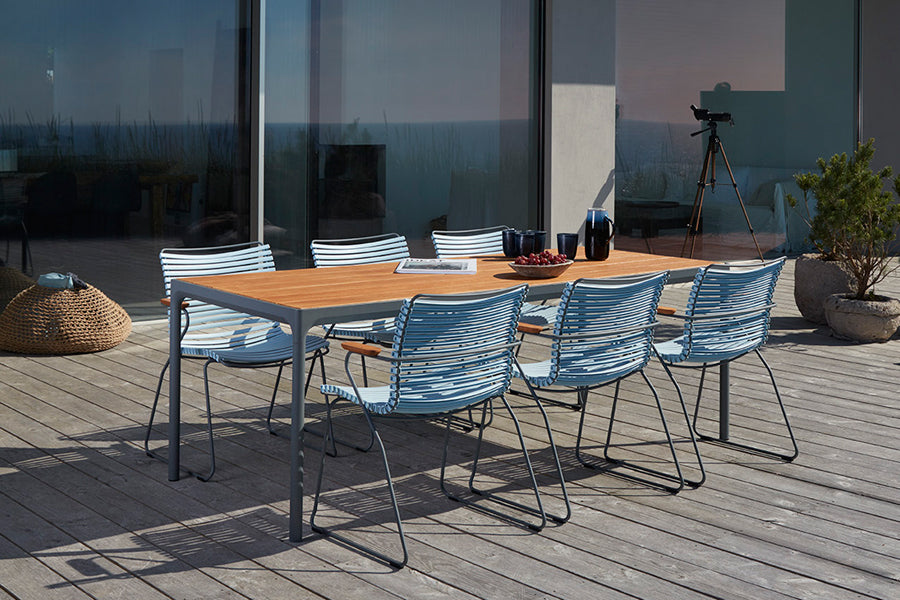 Click Dining Chair by Houe, showing click dining chairs in live shot.