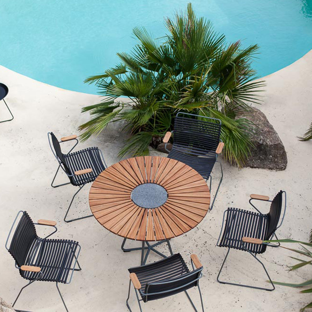 Click Dining Chair by Houe, showing click dining chairs in live shot.