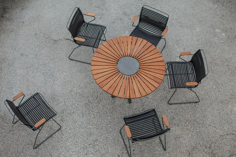 Click Dining Chair by Houe, showing click dining chairs in live shot.