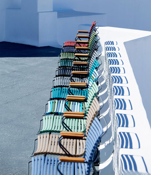 Click Dining Chair by Houe, showing click dining chairs in live shot.