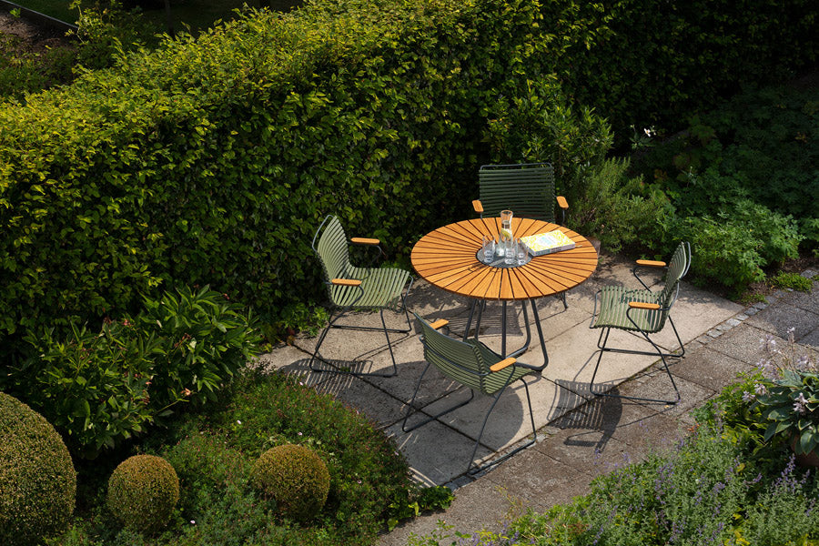 Click Dining Chair by Houe, showing click dining chairs in live shot.