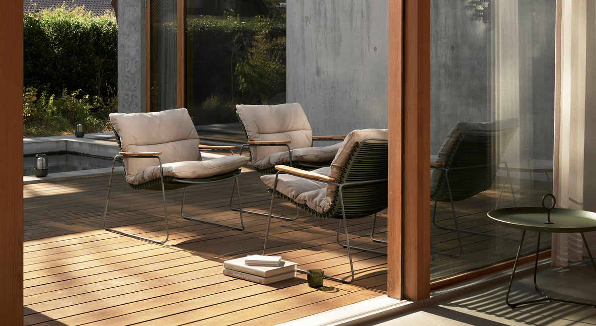 Click Roomy Lounge Chair by Houe, showing click roomy lounge chairs in live shot.