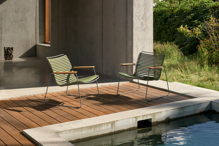 Click Roomy Lounge Chair by Houe, showing click roomy lounge chairs in live shot.