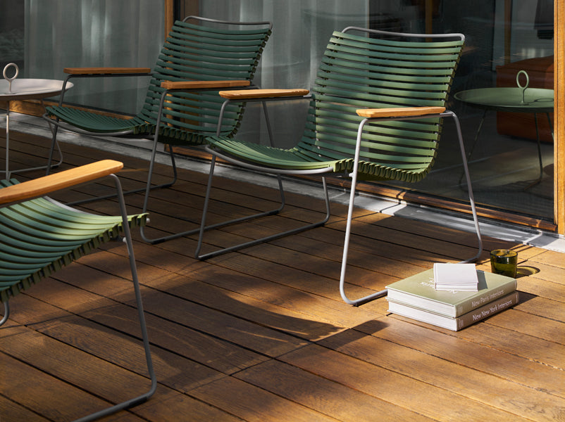 Click Roomy Lounge Chair by Houe, showing click roomy lounge chairs in live shot.