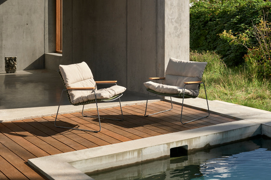 Click Roomy Lounge Chair by Houe, showing click roomy lounge chairs in live shot.