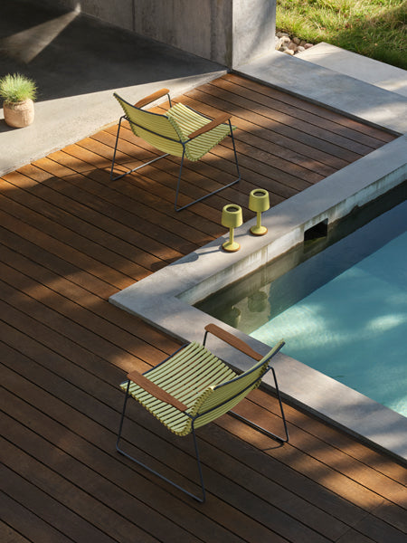 Click Roomy Lounge Chair by Houe, showing click roomy lounge chairs in live shot.