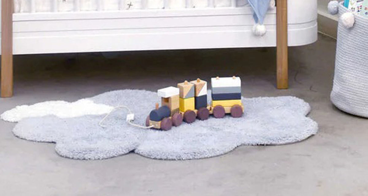 Clouds Washable Rug by Lorena Canals, showing clouds washable rug in live shot.